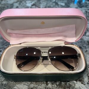 Kate spade brown and gold sun glasses comes with case and cleaning cloth.
